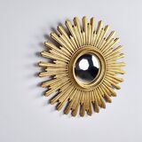 Vintage golden sunburst mirror