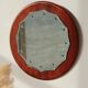 Vintage round teak mirror from the 1960s.
