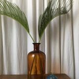 Old thick glass amber bottle