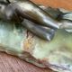Art Deco female sculpture in bronze with onyx base.
