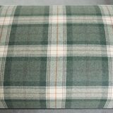 Antique daybed reupholstered with sheepskin and Scottish tartan wool