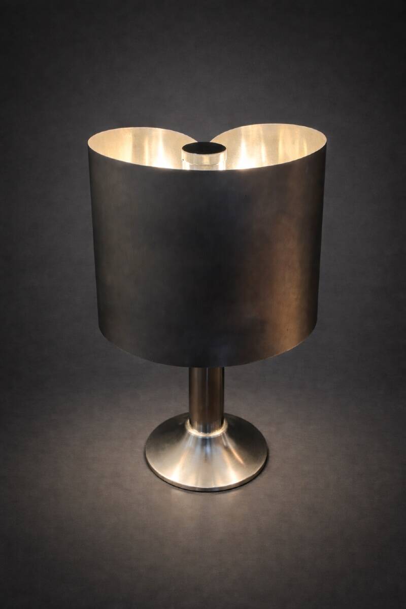 Italian table lamp in stainless steel and chrome from the 1970s.
