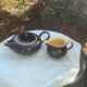 Teapot and milk jug We Two in vintage black and yellow ceramic