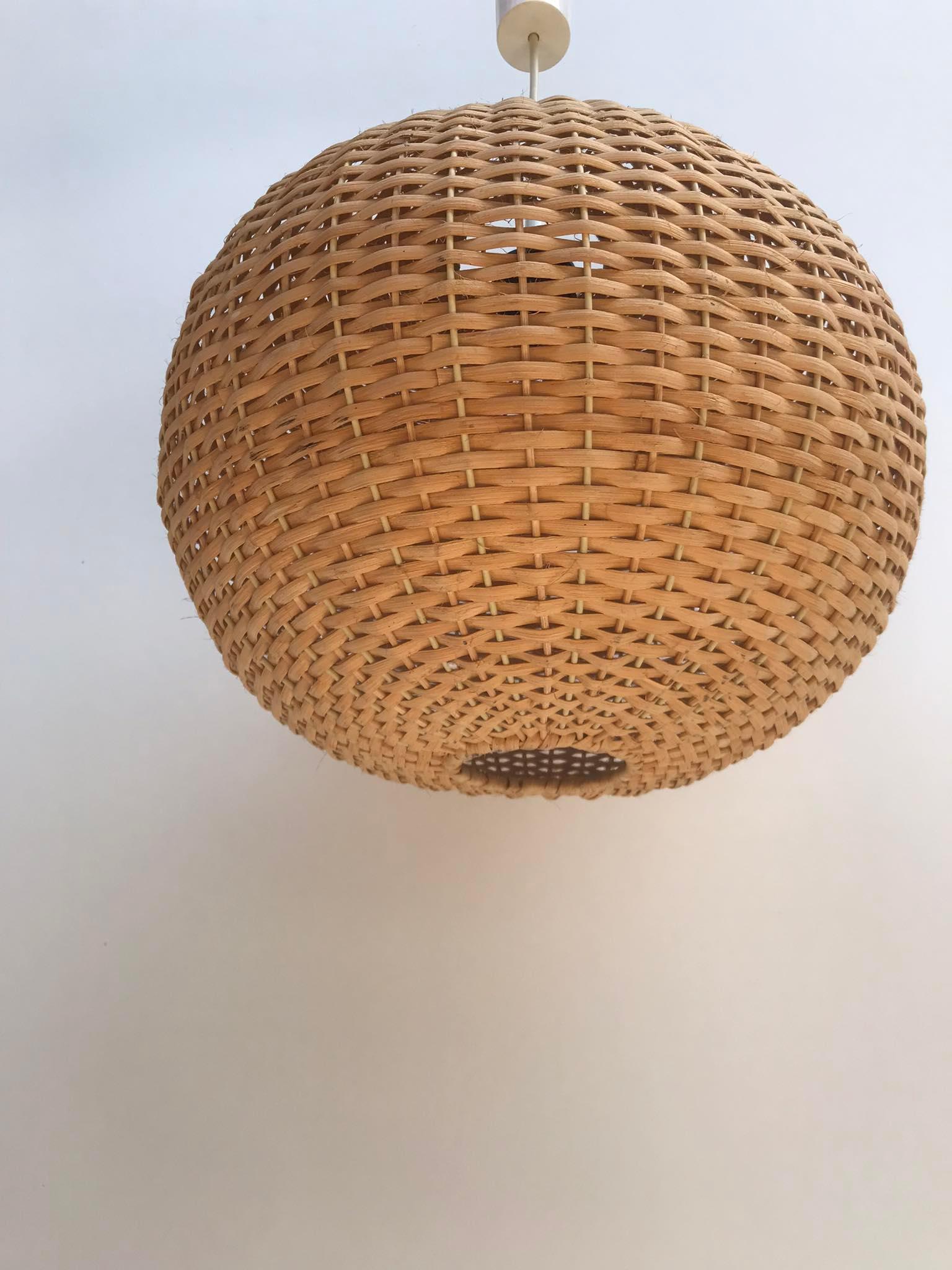 Hanging woven rattan lamp from the 1960s by Jansen Leuchten