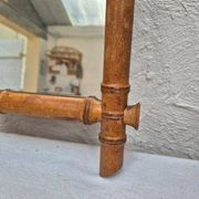 Vintage wooden mirror imitating bamboo