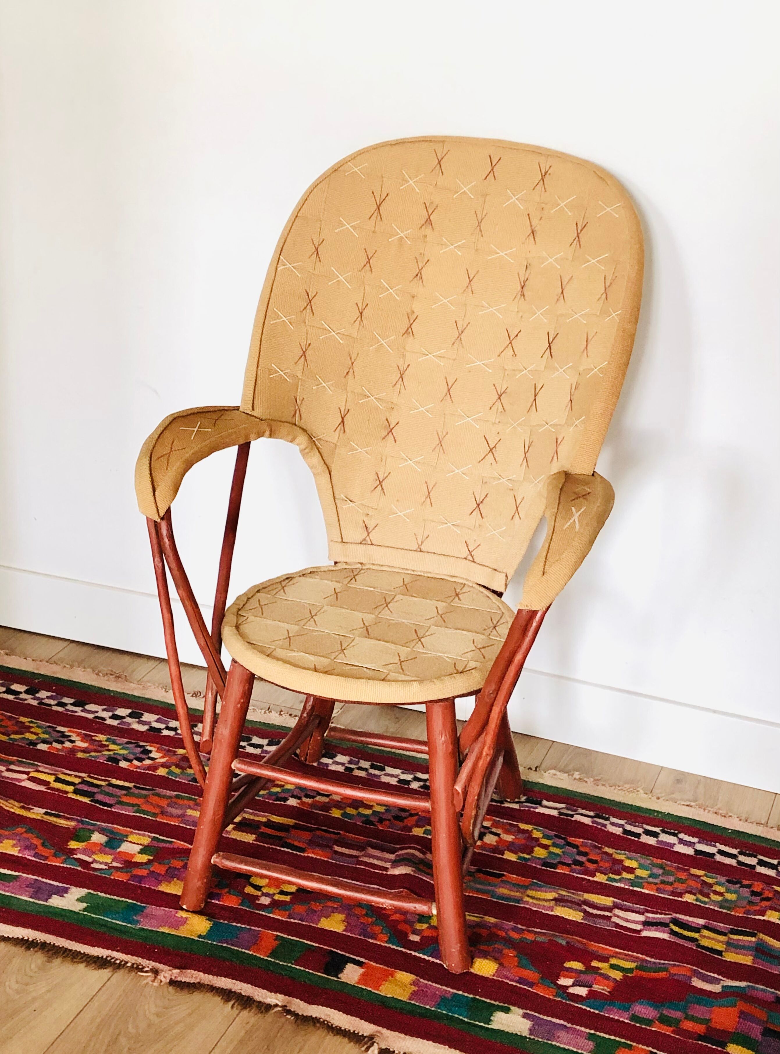 Vintage chestnut armchair and burlap