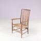 1930s small low spindle-back hearth chair / side chair with wicker seat, Arts & Craft Movement, Morris & Co for Liberty and Co, Stowaway London