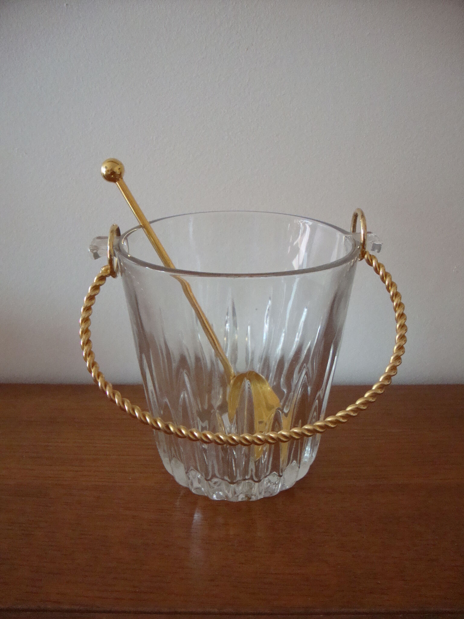 Glass ice bucket and metal dore