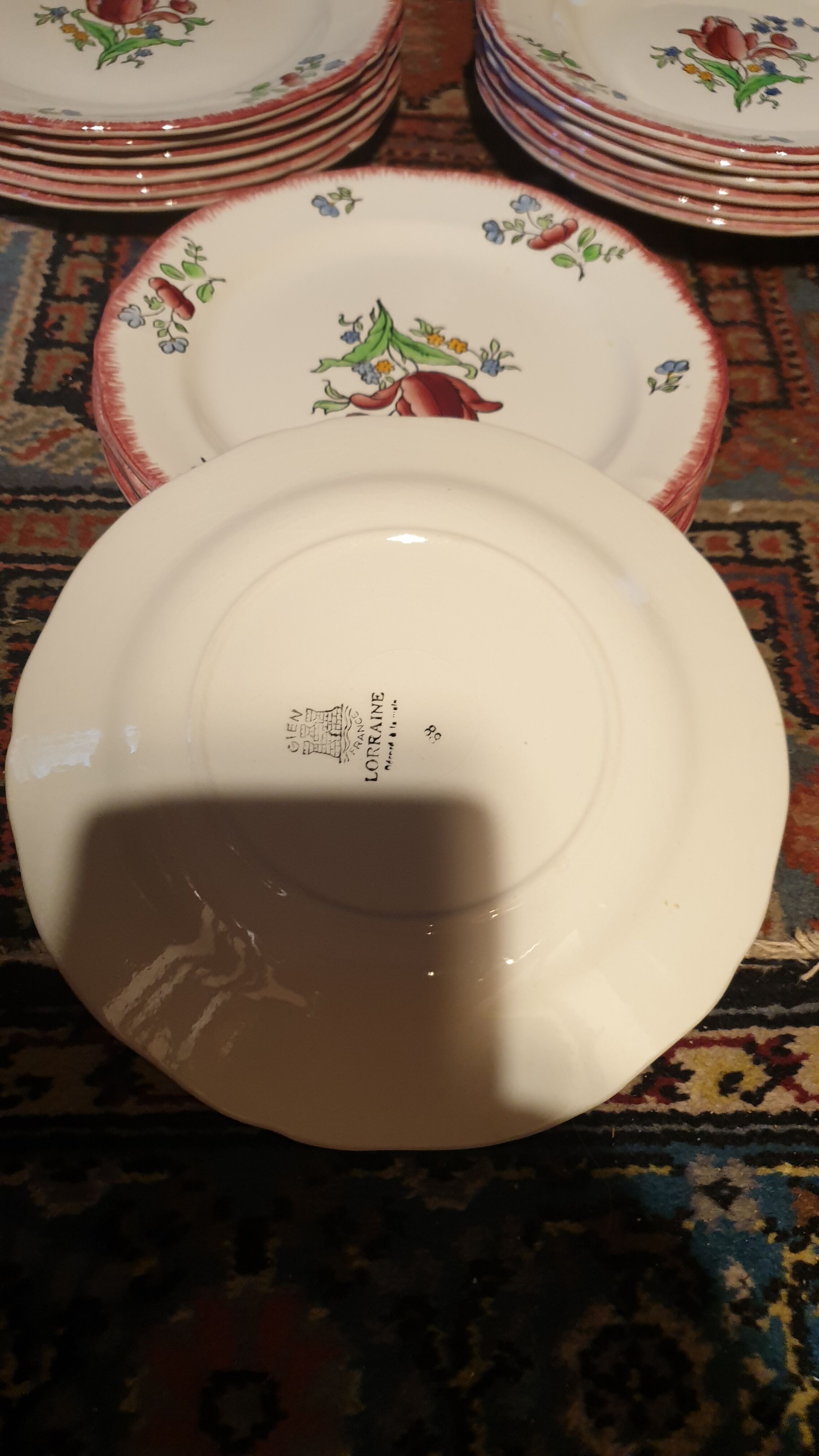 Faience plates of gien floral decoration