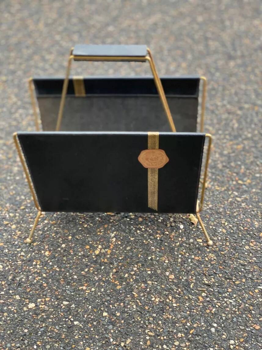 Vintage magazine rack in black leather and gold metal