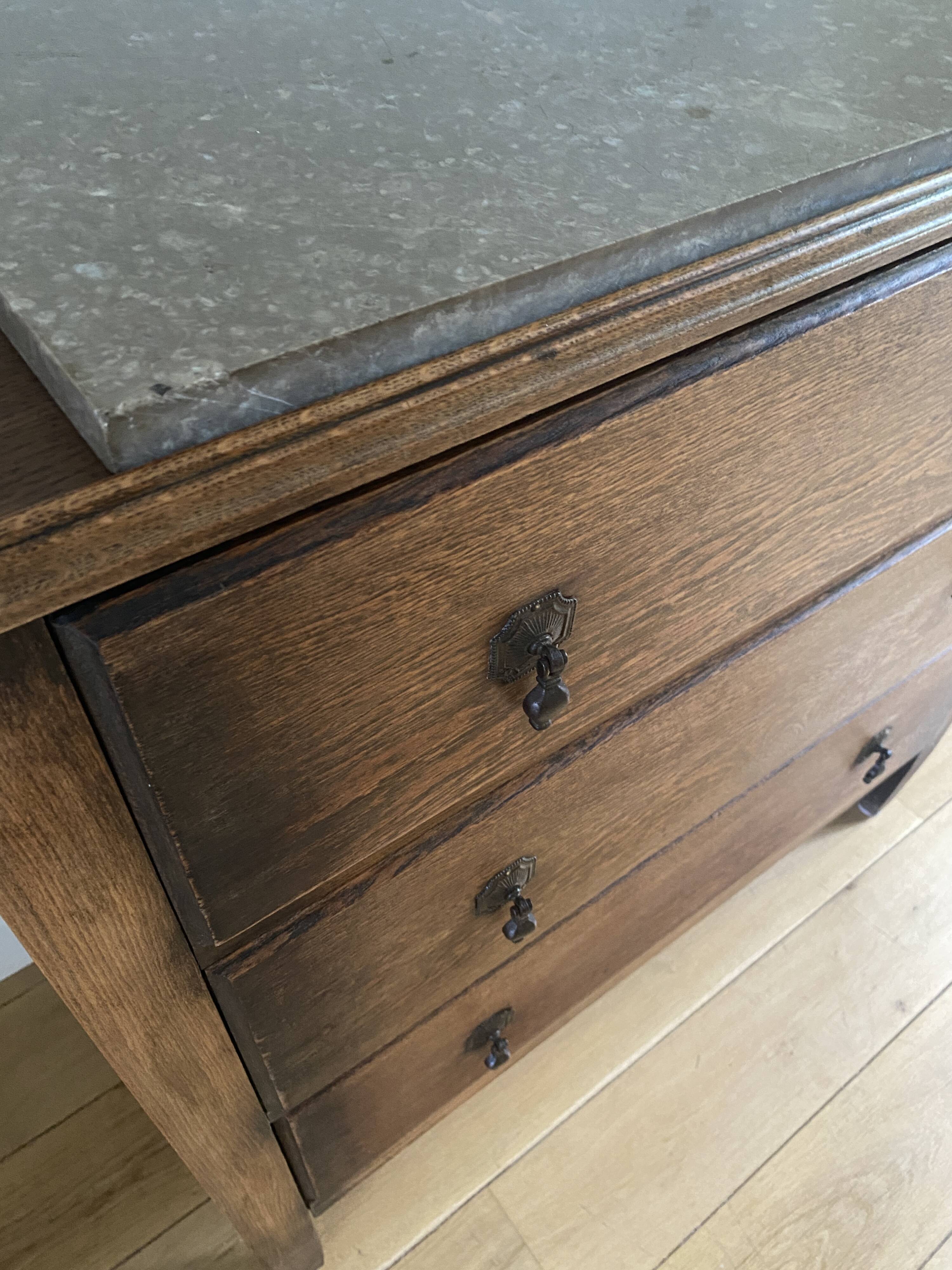 Vintage wooden chest of drawers with three drawers and brown marble top