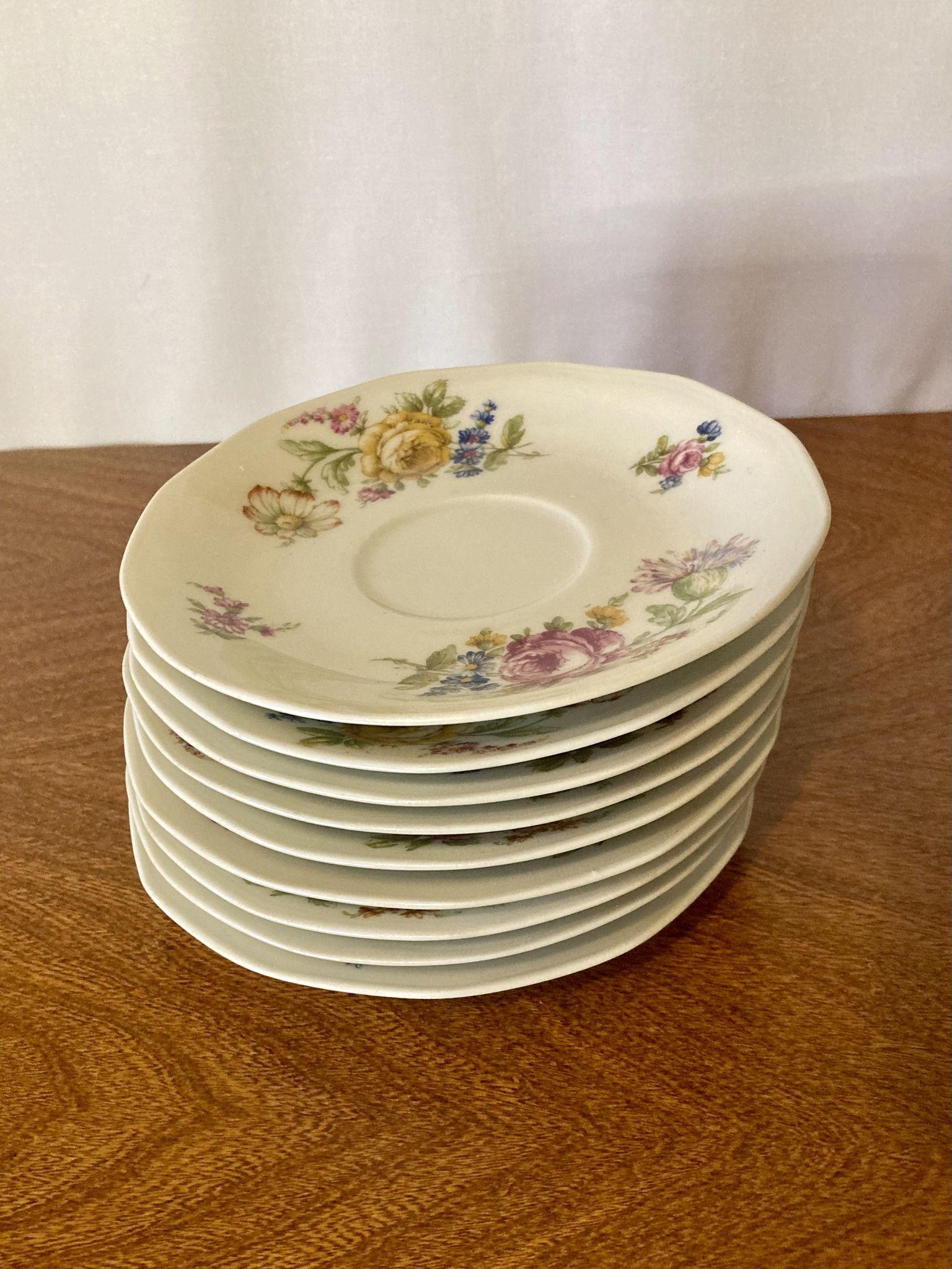 9 Limoges Haviland porcelain saucers or saucers with floral motifs.