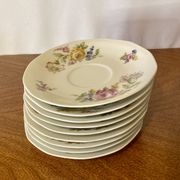 9 Limoges Haviland porcelain saucers or saucers with floral motifs.