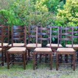 Suite of 17 straw chairs with high backs