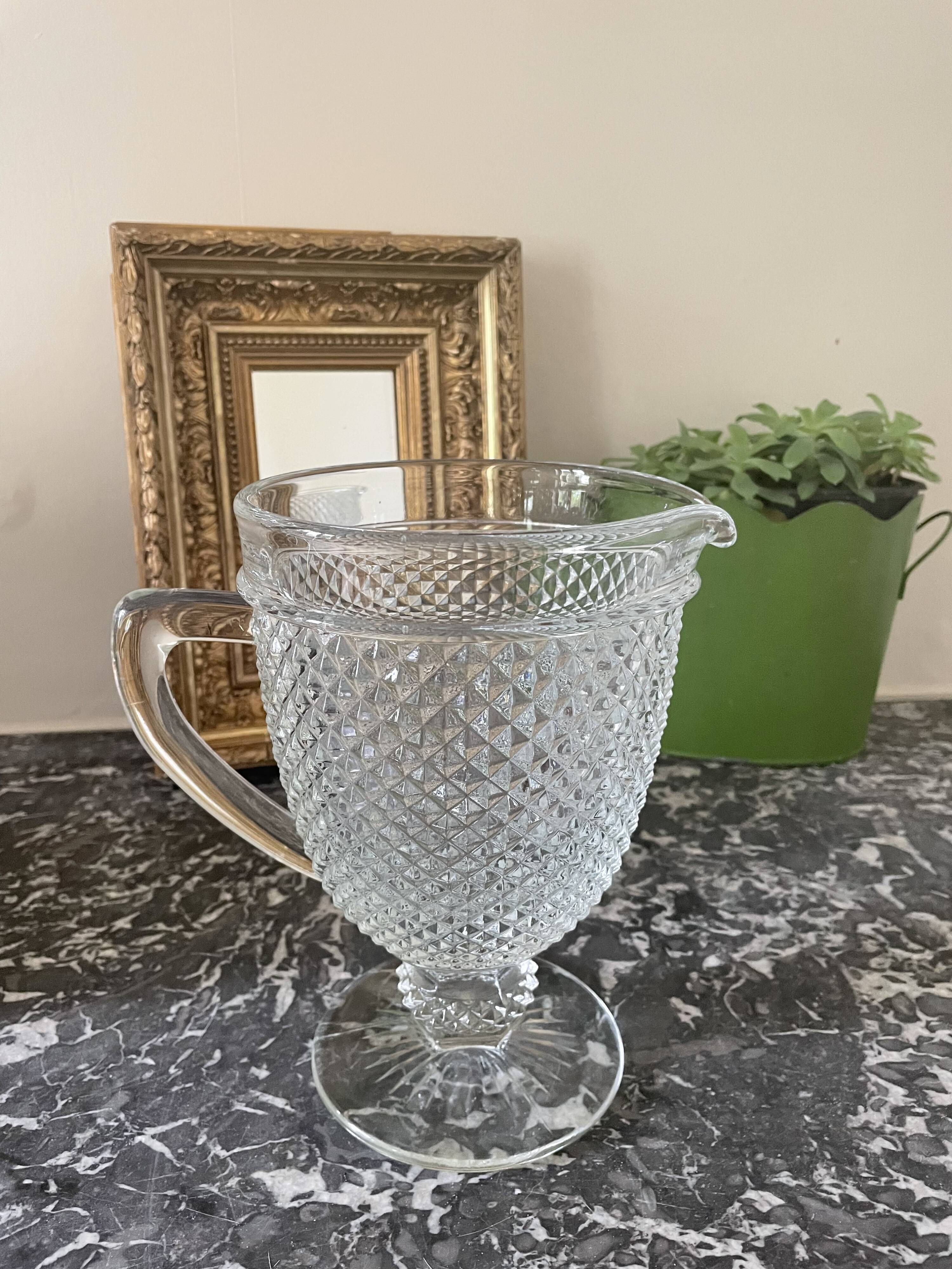 Pitcher on diamond point stand
