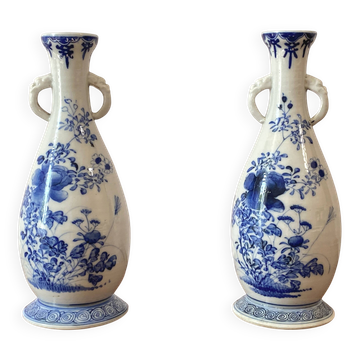 Old pair of blue and white porcelain vases from Japan - in good condition.