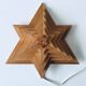 Luminous wooden wall star