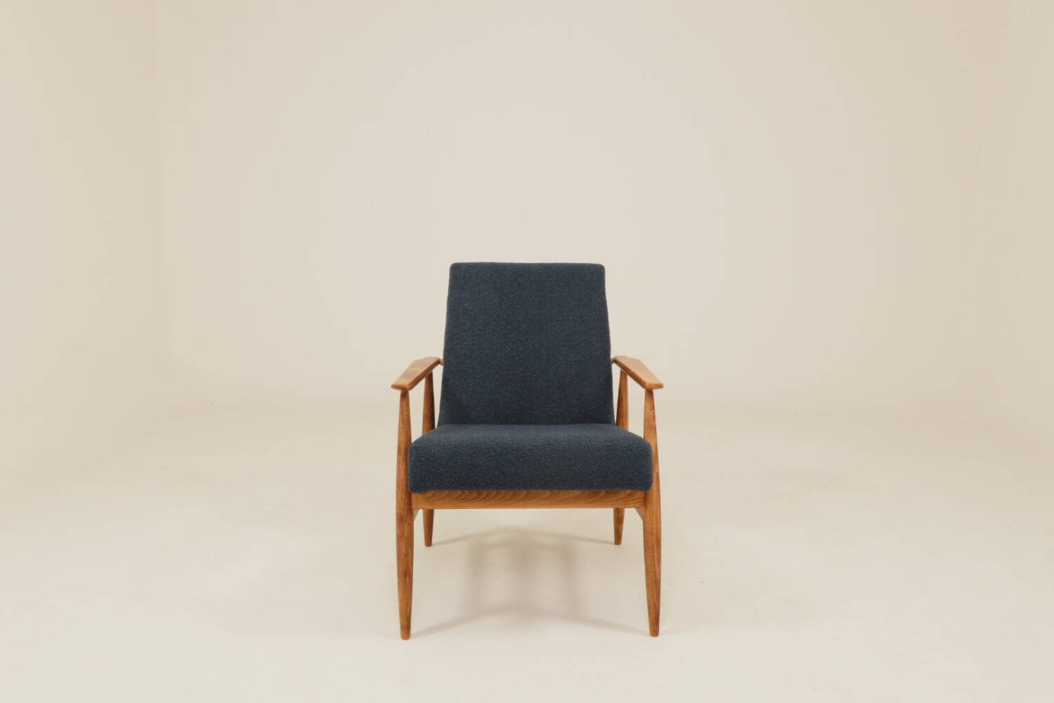 Scandinavian armchair in navy blue bouclé design by H. Lis