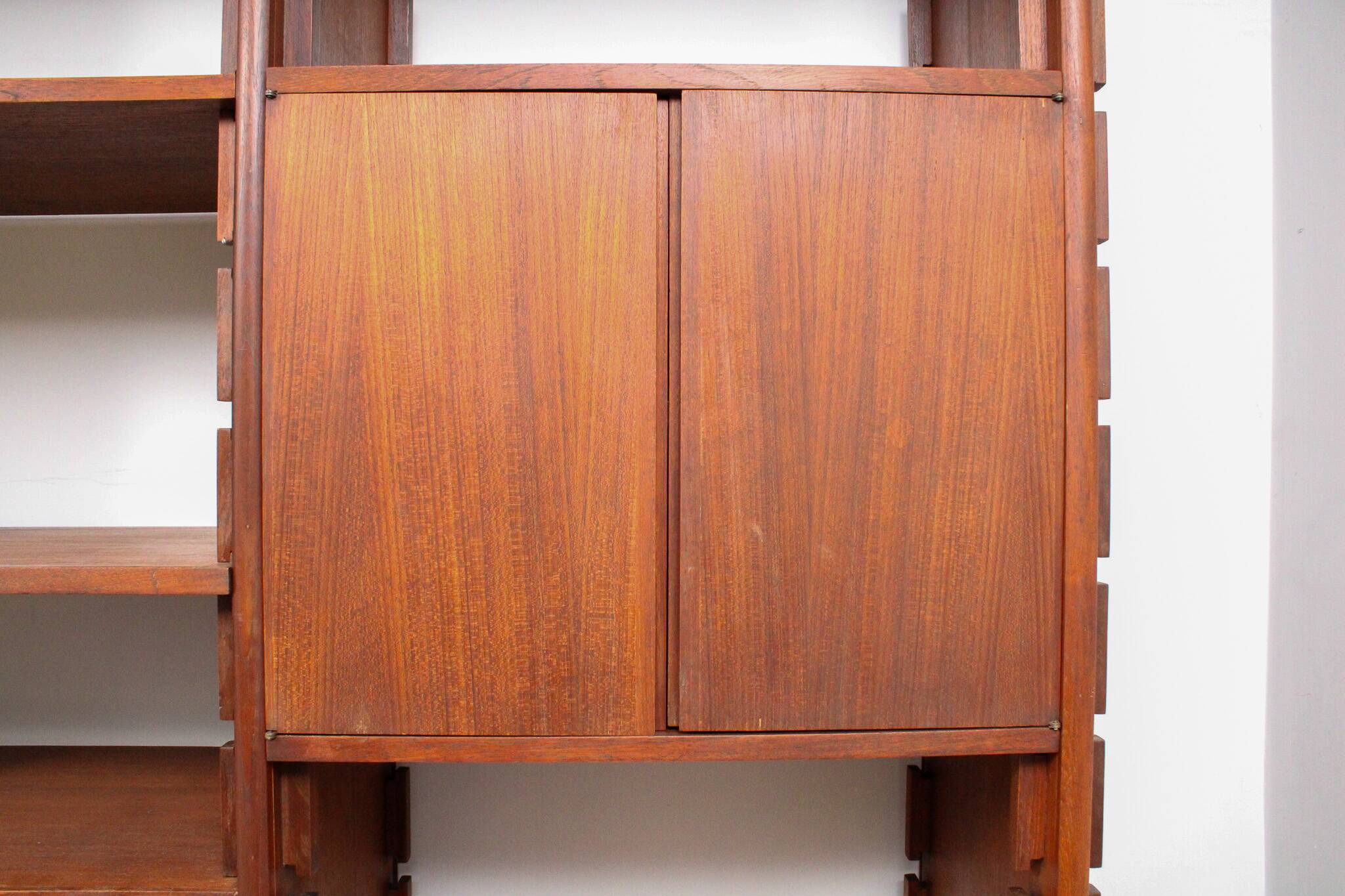 A vintage mid-century teak Gianfranco Frattini style bookcase room divider