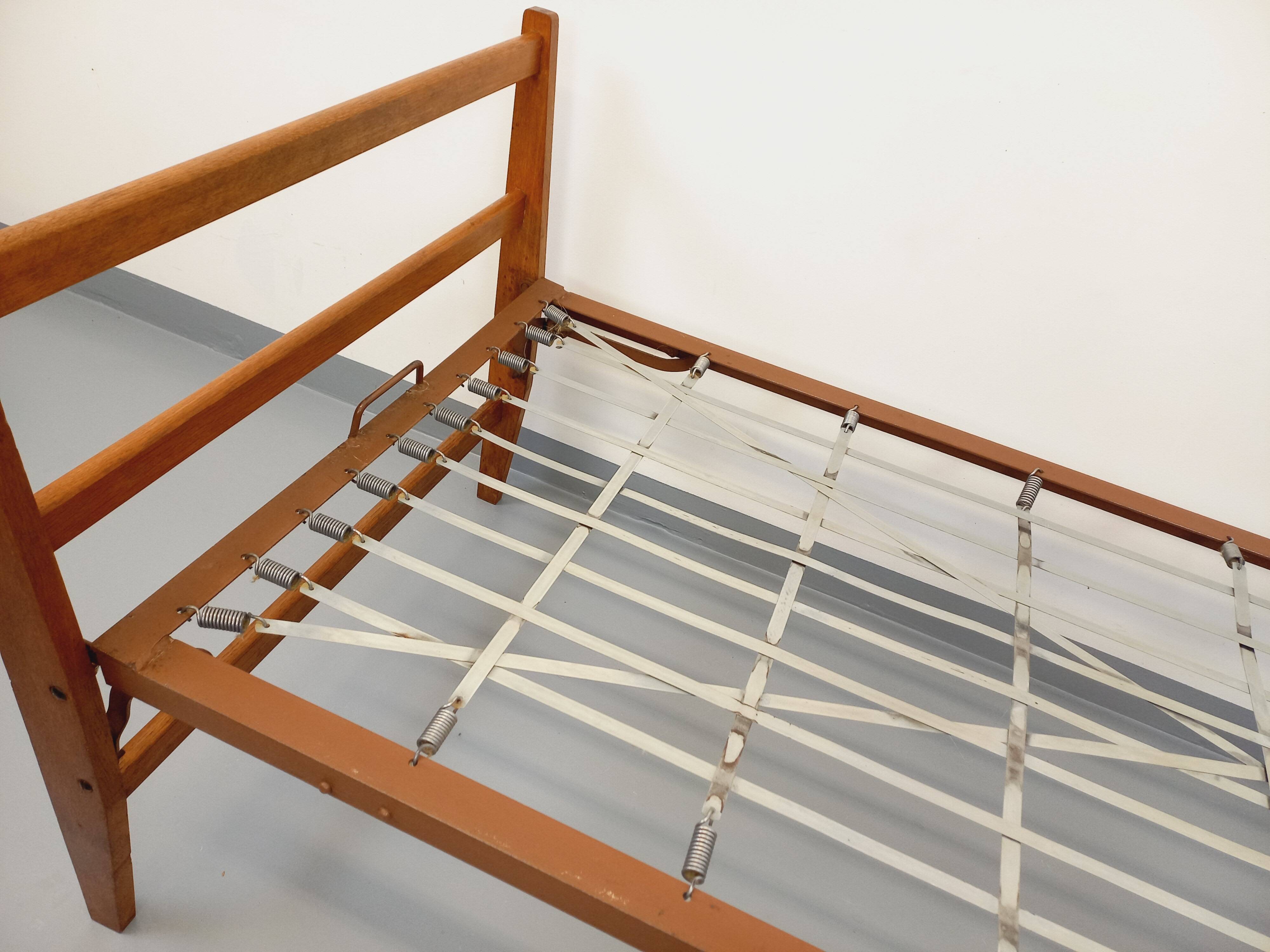 Pair of vintage stackable daybeds in oak wood and metal from the 60s