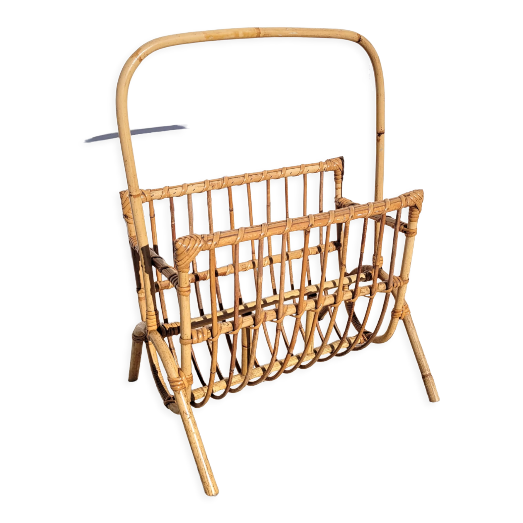 Curved rattan magazine holder 1960