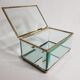 Jewelry box in bevelled glass and gold metal