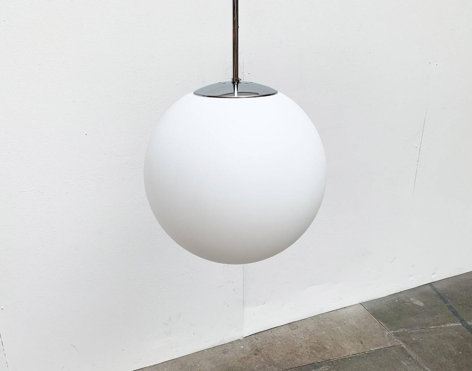 Vintage German space age glass ball pendant lamp by Limburg.