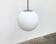 Vintage German space age glass ball pendant lamp by Limburg.