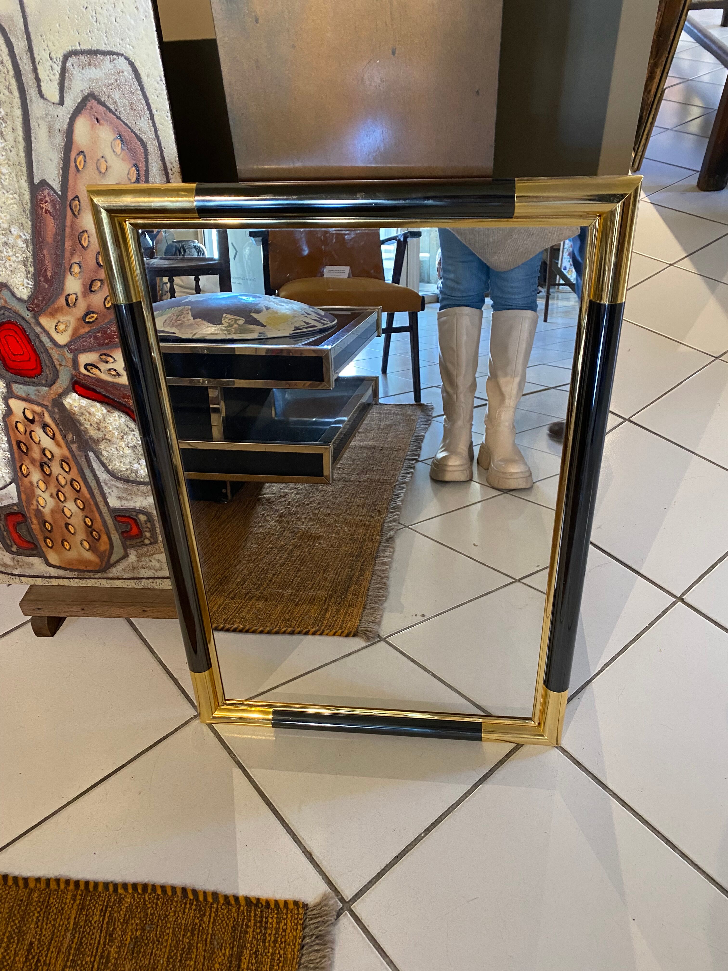 Steel and brass mirror, 47x67 cm