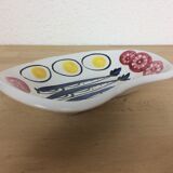 Cup in ceramic, fish and raw vegetables