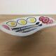Ceramic bowl, fish and raw vegetables