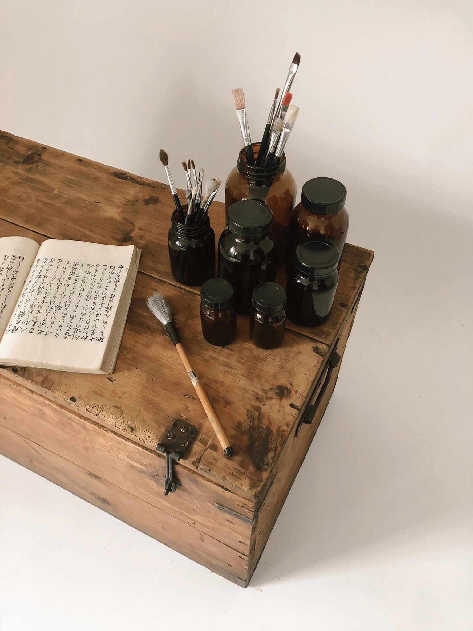 Lot of 7 bottles of amber glass apothecary style
