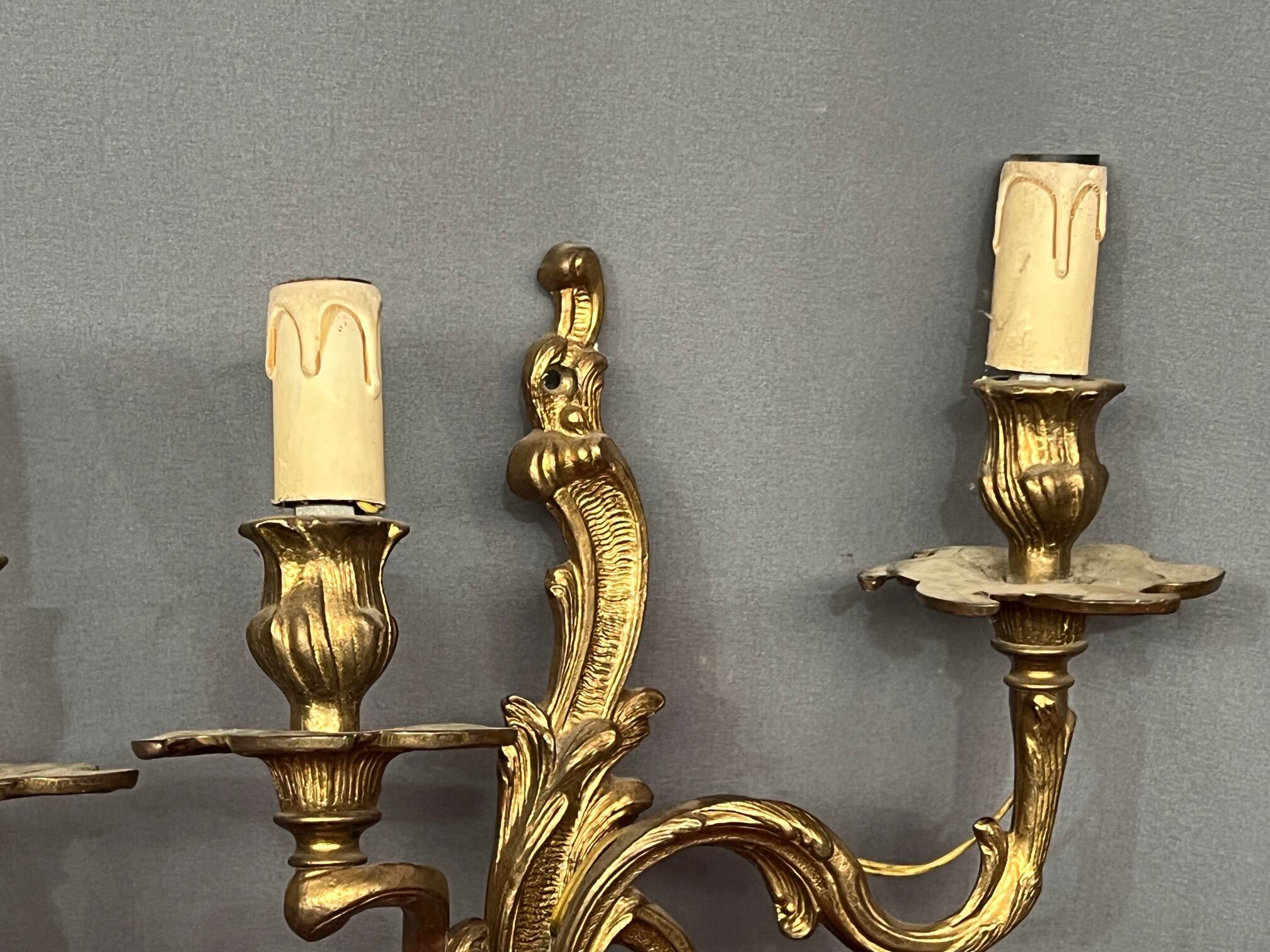 Pair of Rococo gilded solid bronze wall lights.