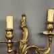 Pair of Rococo gilded solid bronze wall lights.