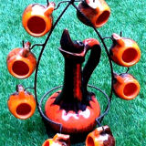 1960s-1970s liquor service including a decanter and 8 cups