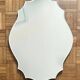 Decorative mirror with scalloped edges