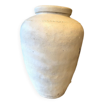 Old limed terracotta jar
