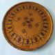 Round top in carved wood and vintage varnish