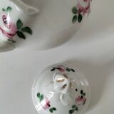 Porcelain teapot with rose patterns