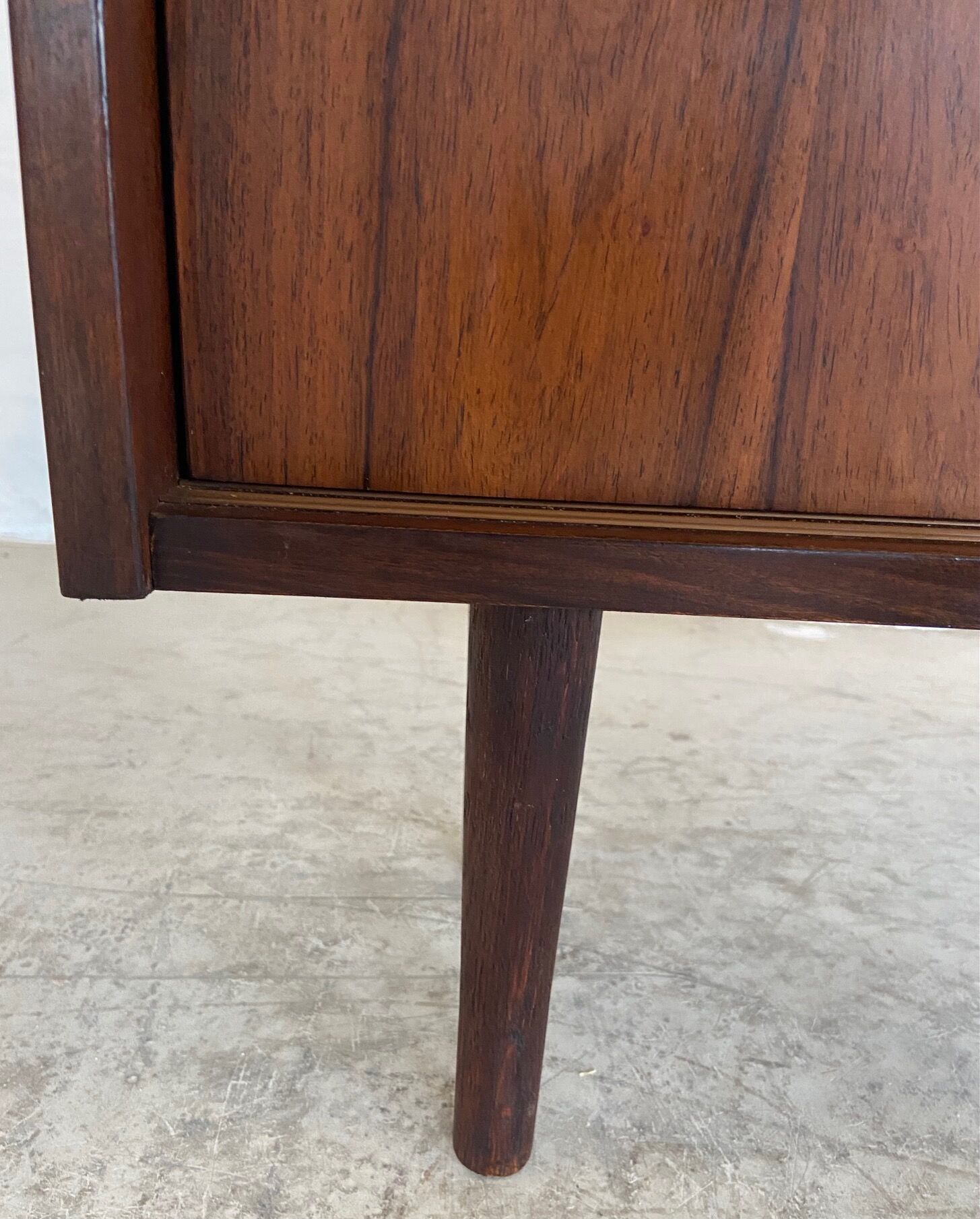 Danish retro vintage library in rosewood with sliding doors from the 1960s.