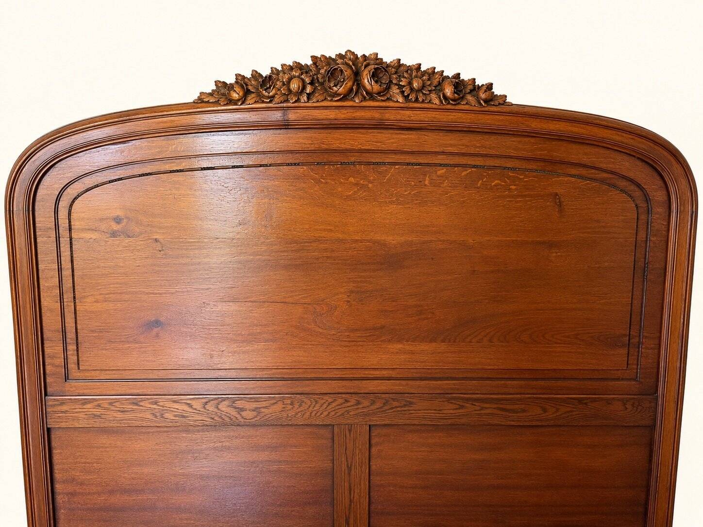 Double bed Louis XV carved walnut with roses and cabriole legs.