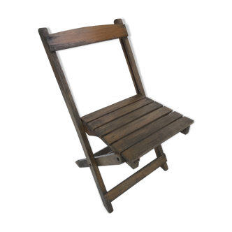 Old folding chair child in wood