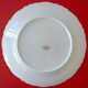Suite of twelve table plates in white porcelain, golden lip