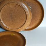Quatre assiettes de potier en grès émaillé vintages