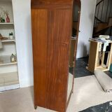 Pair of rounded mirrored wardrobes