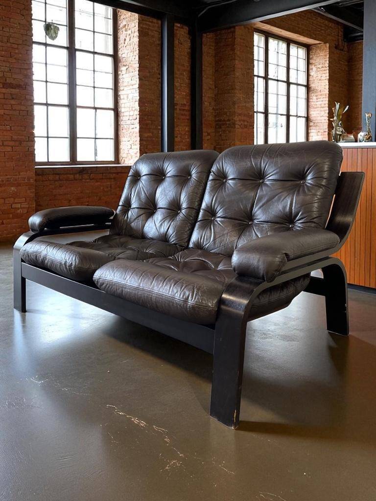 Vintage brown leather two-seater sofa/chaise longue