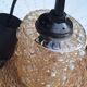 Suspended portable lamp