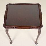 Glass flame and mahogany side table