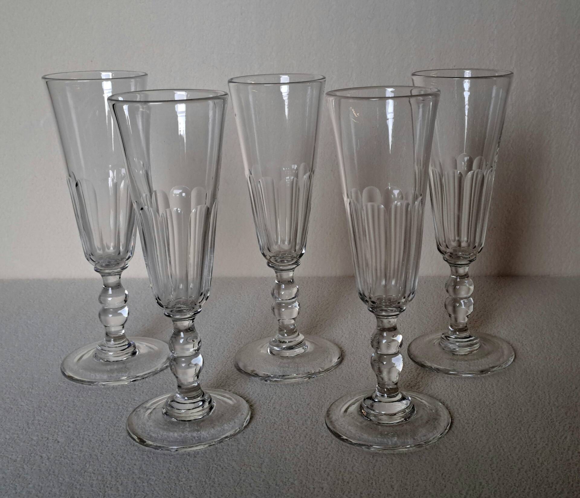 5 crystal Champagne flutes from Baccarat, Clermont model, 19th century.