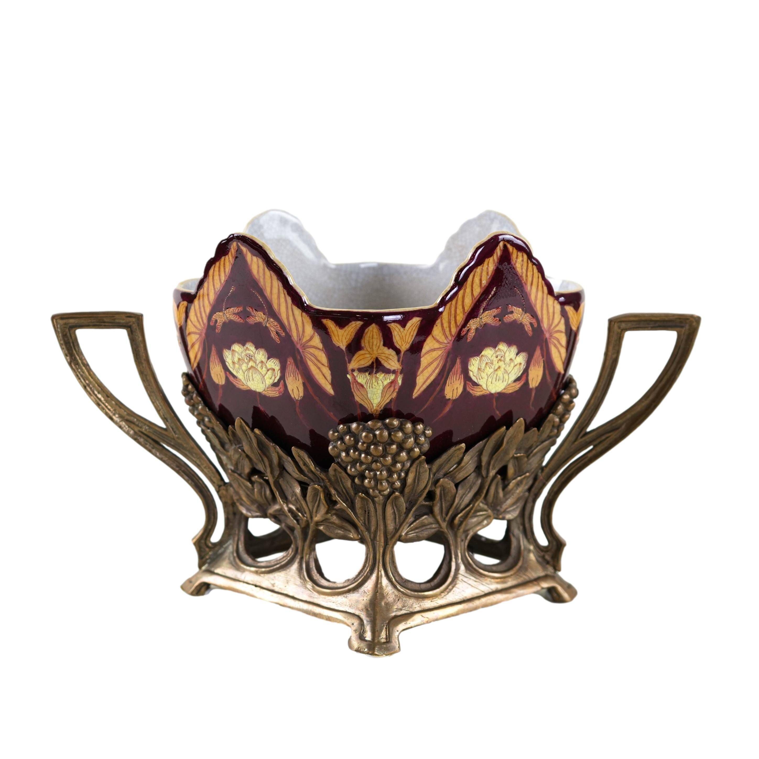 Art Nouveau ceramic platter in gilded basket with grapevine motif, Europe